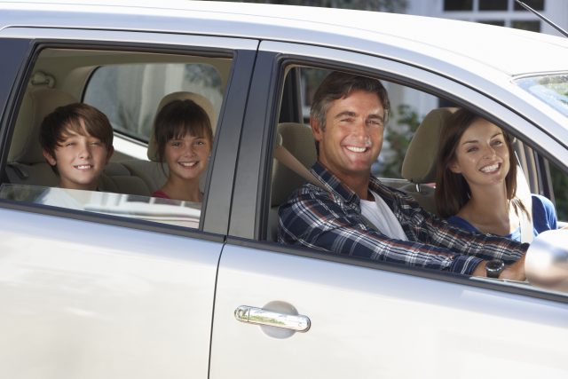 Family Setting Off On Car Journey